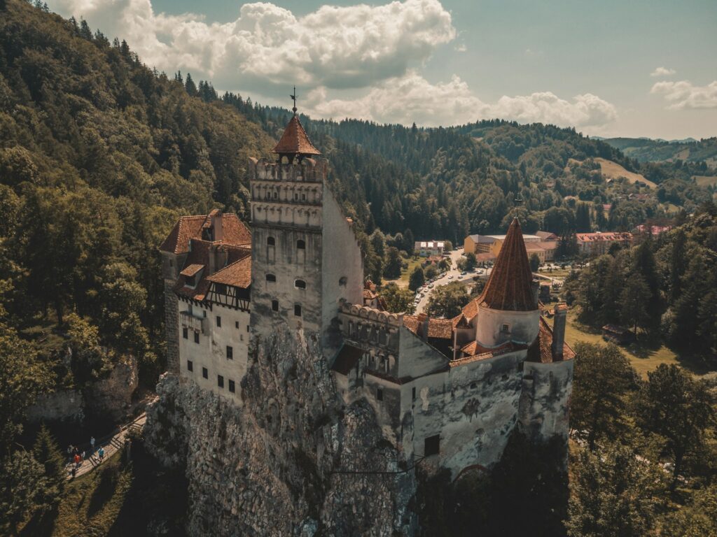 Bran Castle rising above the trees in Transylvania, Romania