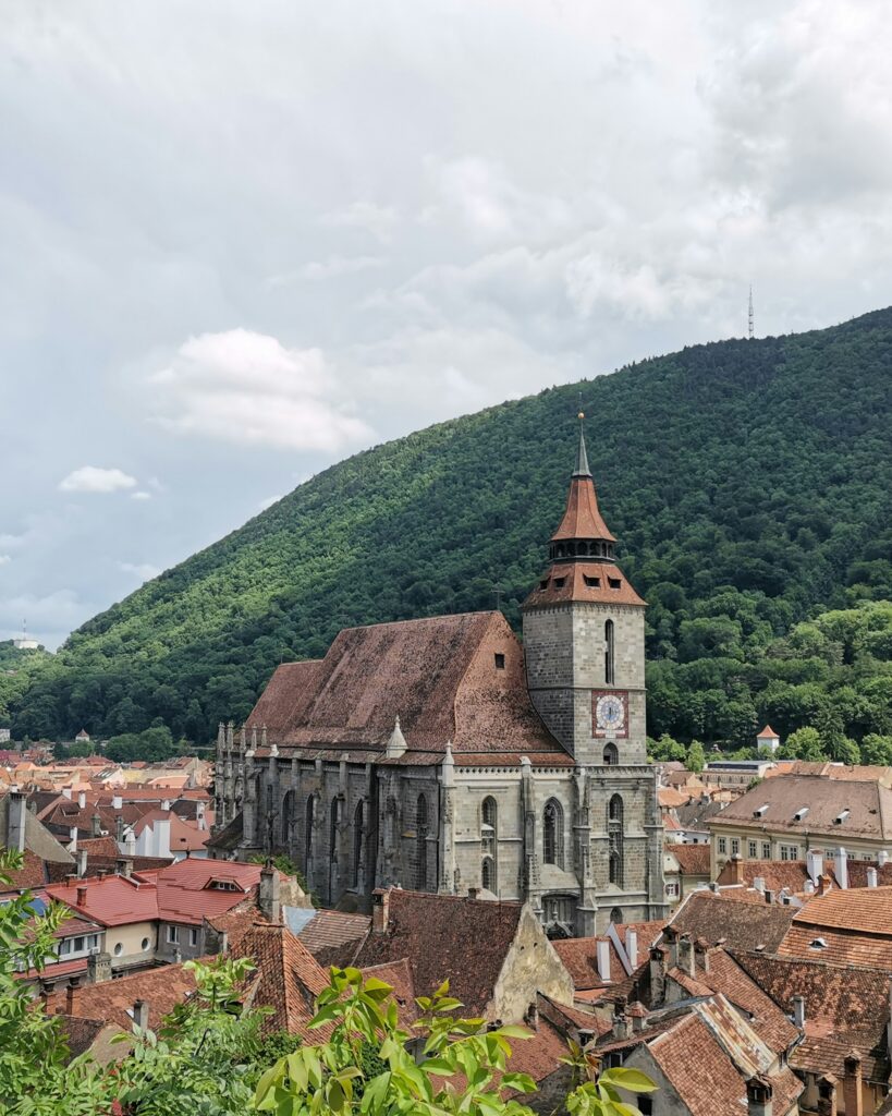 The Black Church beneath the wooded slopes of Tâmpa in Brașov, Romania